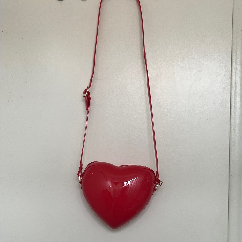 Heart-Shaped Red Crossbody Bag fits a lot of thing